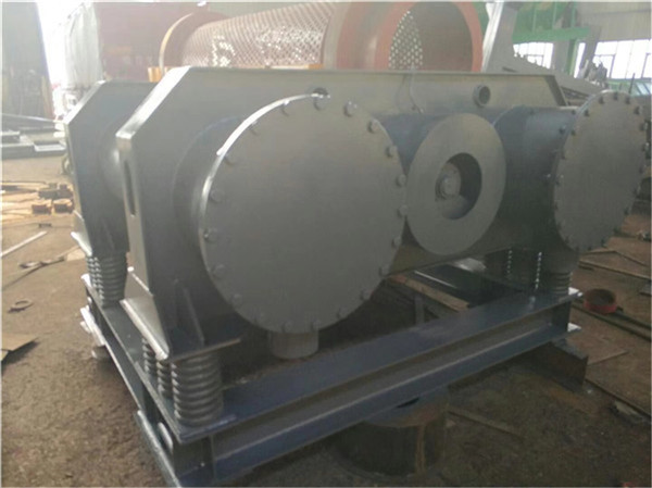 連續(xù)式雙頭振動磨的工作原理及應(yīng)用