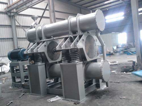 連續(xù)式雙頭振動磨的工作原理及應(yīng)用